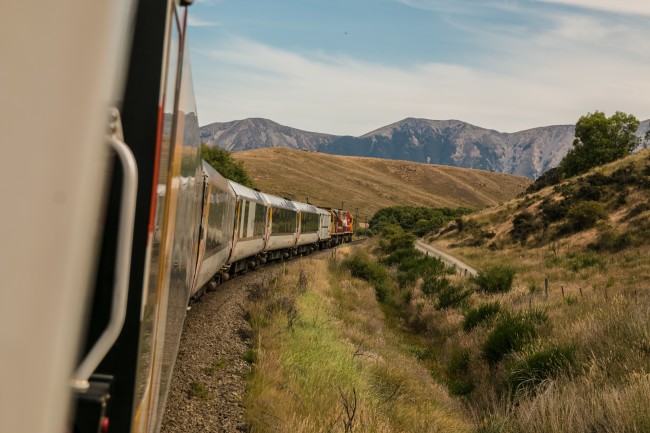 Train travelling through mountains