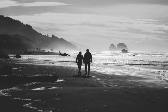 couple having a romantic walk on the beach